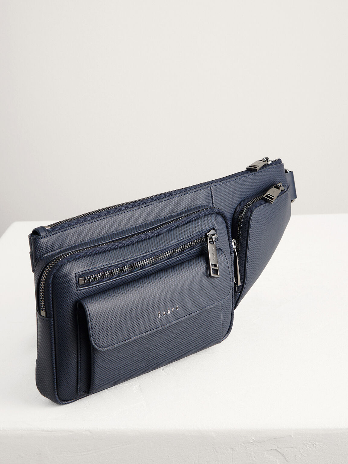 Tas Selempang Timbul, 
