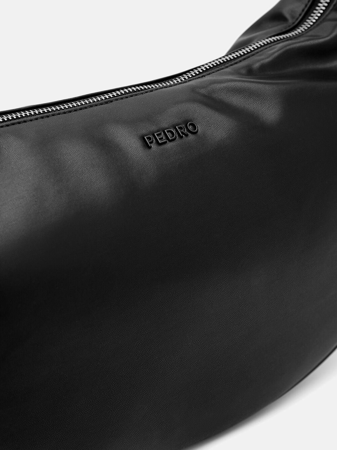 Tas Selempang Kurva, 