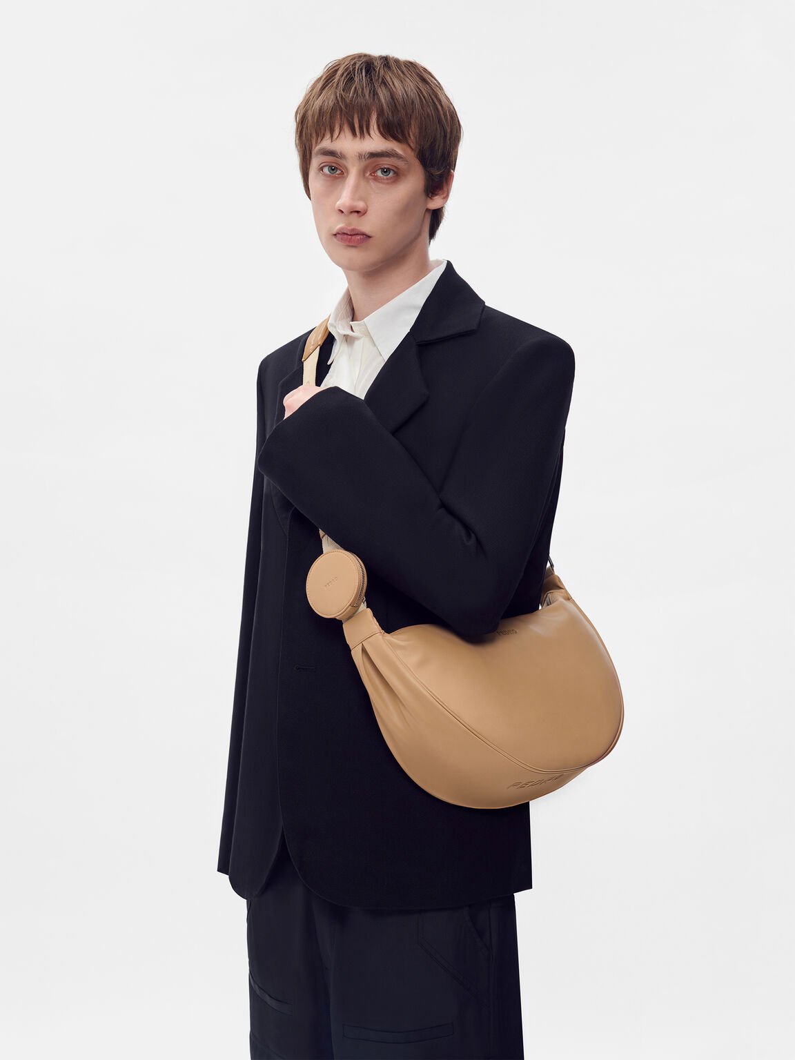 Tas Selempang Kurva, 